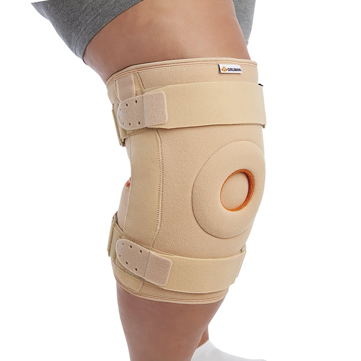 WRAPAROUND KNEE SUPPORT WITH BIAXIAL JOINTS AND METAL SUPPORTS