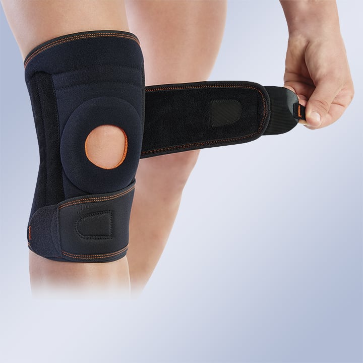 WRAP AROUND KNEE SUPPORT WITH MEDIOLATERAL STRAPS